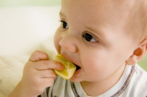 baby with lemon illustrates an early example of kids in STEM